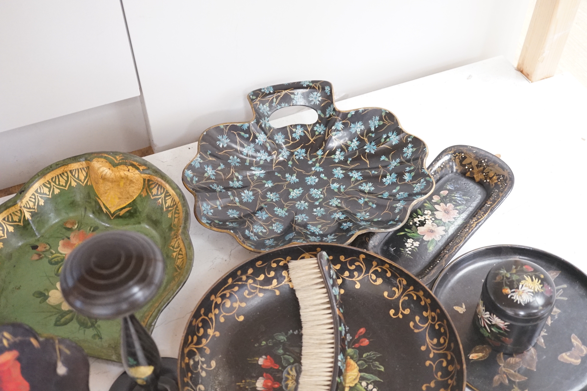 A Victorian papier mache candle box, two crumb scoops and four other items